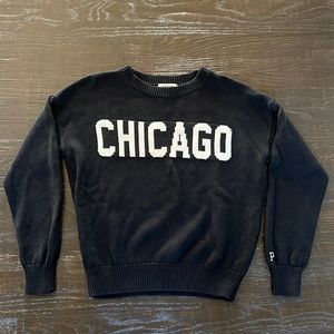 VS Pink sweater in black with white lettering in size Med